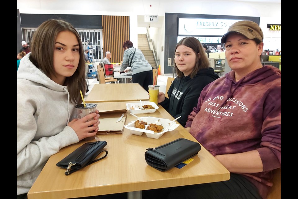 Haylee, a Grade 11 student at Hornepayne High School (left), friend Amber, a Grade 9 student at Hornepayne and Haylee’s mother Marcia (right) are not looking forward to the possibility of a return to remote learning if a deal between CUPE and the Ontario government isn’t reached, Nov. 18, 2022. 