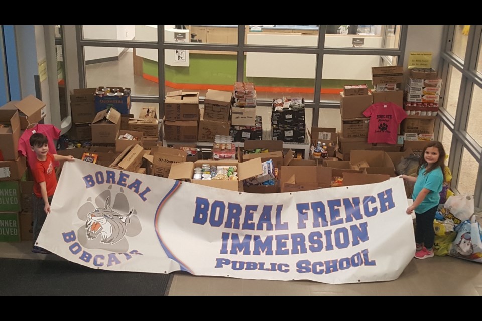 Boreal - Trevor and Arlie representing JSA- The Winning Class with over 400 cans collected. 3616 items in total. Photo supplied by ADSB
