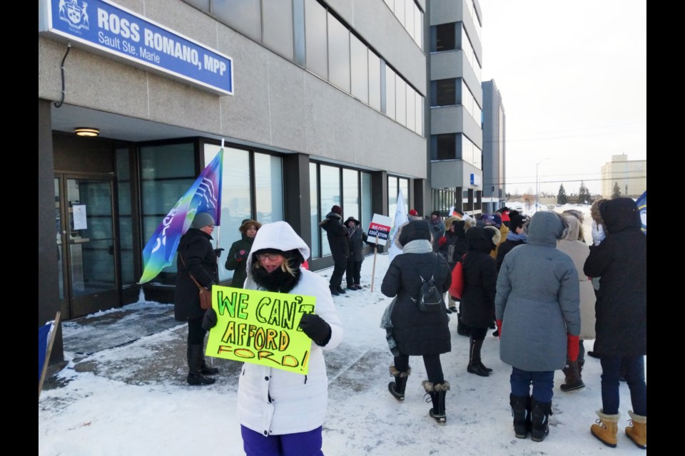 Algoma District School Board (ADSB) teachers and other educational workers held a one-day strike, picketing outside Sault MPP Ross Romano’s office and at other sites, Jan. 8, 2019. Darren Taylor/SooToday 
