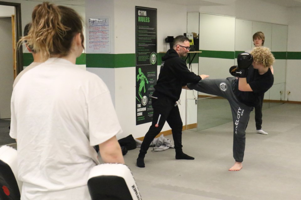 High school students are being taught combat sports at Steel City MMA as part of the Minds in Motion Academic Program. 