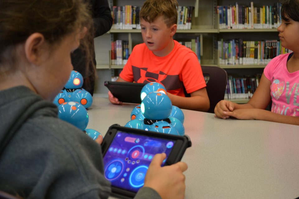Problem solving using the Blockly app and Dash. Photo supplied by Huron-Superior Catholic District School Board