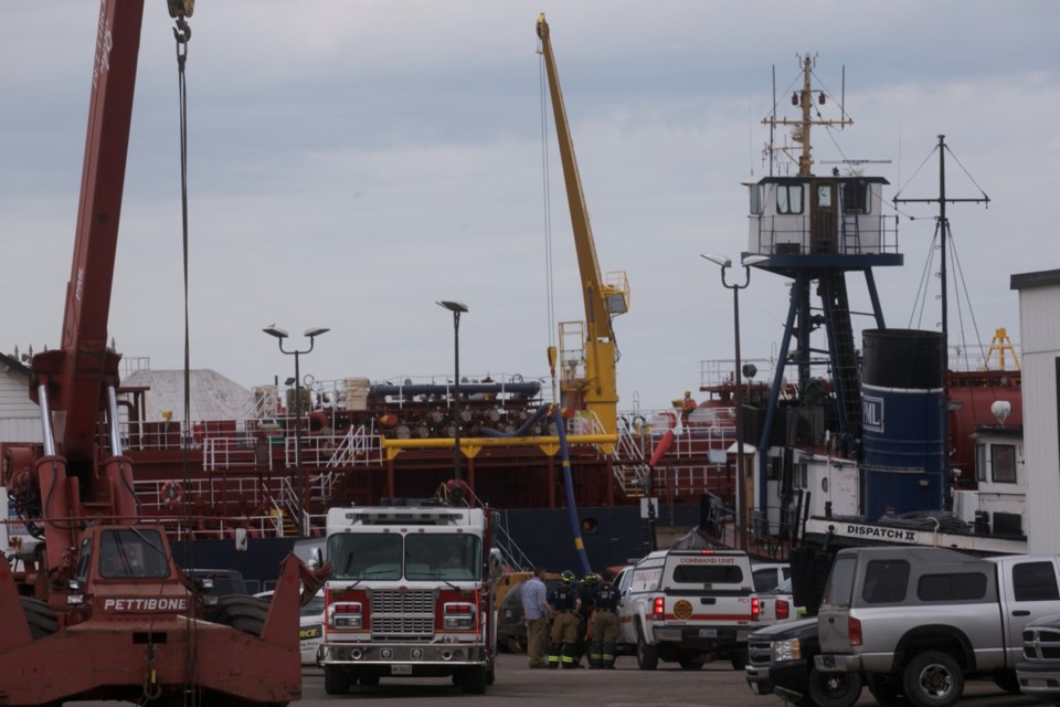 Emergency crews respond to an oil spill on the St. Marys River on June 9, 2022.