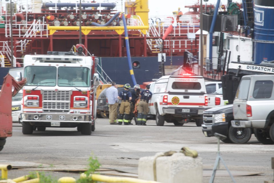 Emergency crews respond to a reported oil spill on the St. Marys River on June 9, 2022.