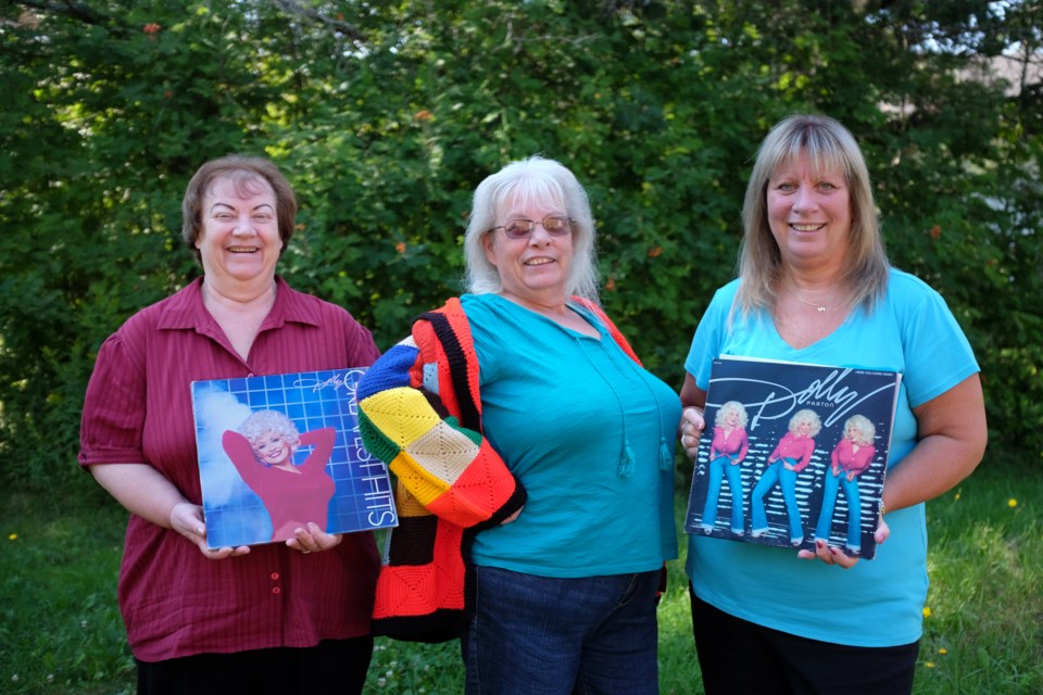 The Parton sisters: (from left) Pam Girard, Patti Peiffer, and Paula Moody will be going to see Dolly Parton at the Essar Centre on September 10. Throughout their lives, the sisters have found several uncanny parallels between their lives and the famous country singer. Peiffer will be bringing her family's 'Coat of many Colours'. Jeff Klassen/SooToday 