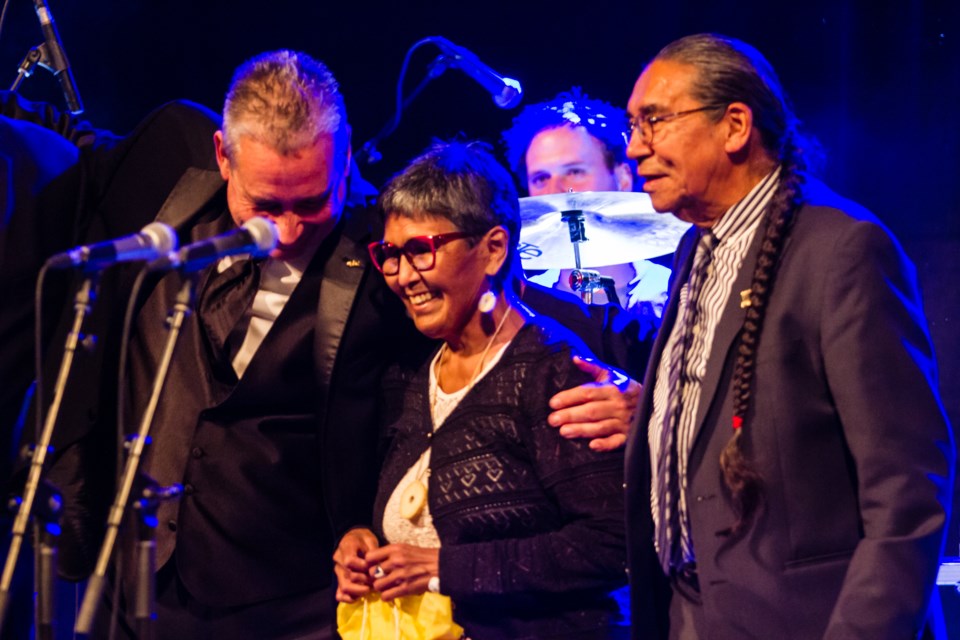 Edna Elias, former commissioner of Nunavut, is presented with a birthday gift prior to the Jerry Cans' performance at the Machine Shop on Wednesday, Oct. 9, 2019. Donna Hopper/SooToday