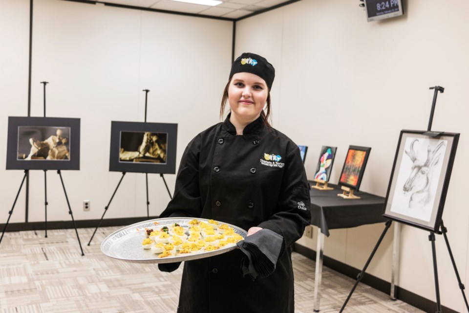 Katherine Torrence, Grade 12 Culinary Arts student from St. Mary’s College, cocktails appetizers prepared by fellow classmates, as part of The Mayor’s Youth Advisory Council’s Youth Art Gala featuring local youth artists held at the Civic Centre.  All proceeds from the event go to the Paediatric Wing at ARCH.  Jenn Inglis for SooToday
