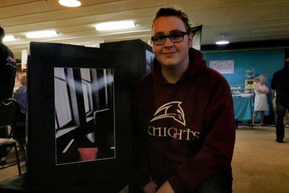 Grade 12 photography student Shae McLurg showed SooToday his photos of the old General Hospital site, which was part of the 'sense of place' photography project. The photos were on display at Mill Market Saturday. James Hopkin/SooToday