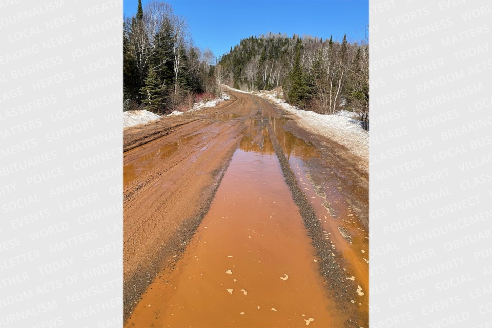 Photo shows orange runoff near a creek that feeds Wawa Lake, a local water source. The Ministry of the Environment says it has tested samples of the water and is monitoring the situation.