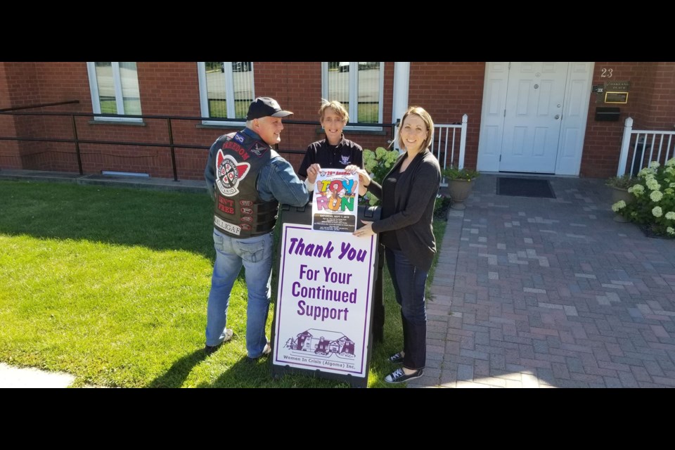 Biker's Rights Organization member, Bev Beauchamp, Chairwoman of the Toy Run and Julie Strachan, Child Support Worker with Women In Crisis. Sandi Wheeler/SooToday