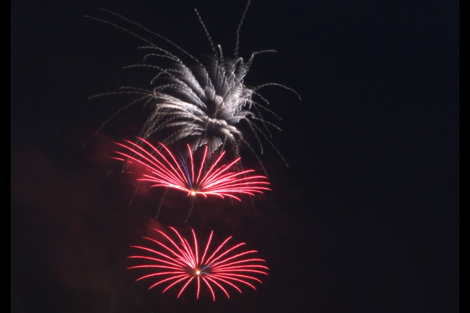 After a brief but dramatic thunderstorm the humidity was still high for Canada Day fireworks 2018, but that didn't stop crowds from thronging to the waterfront on Sunday night. Carol Martin/SooToday