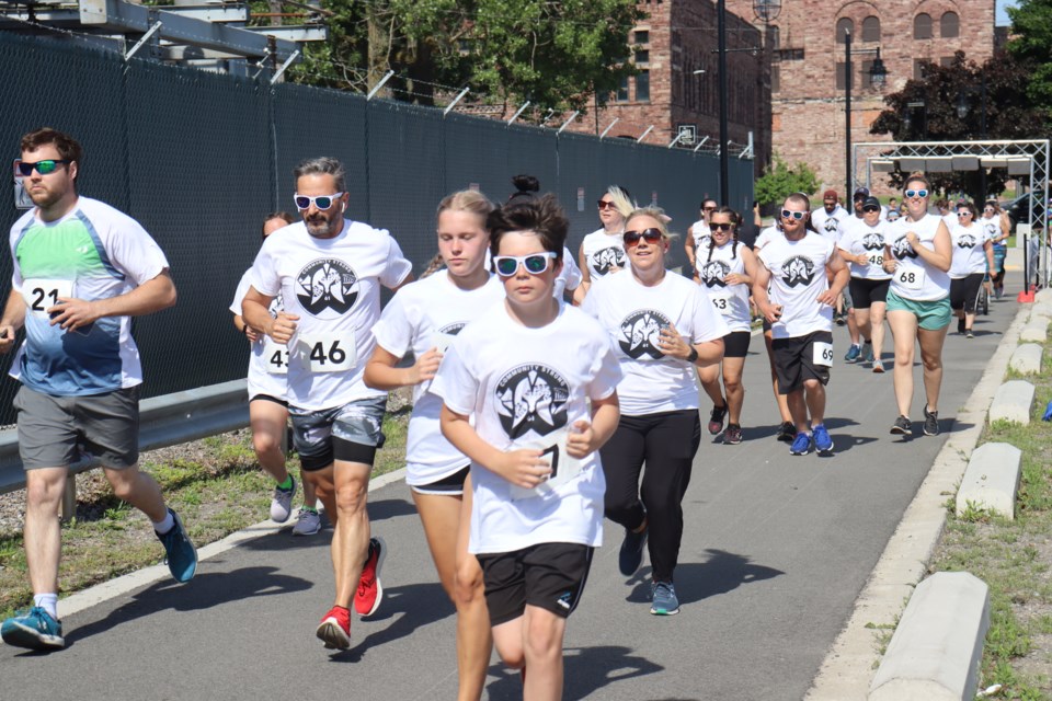 Community Strong Festival participants began their 5 km run in white t-shirts, and returned in all sorts of colours. 
