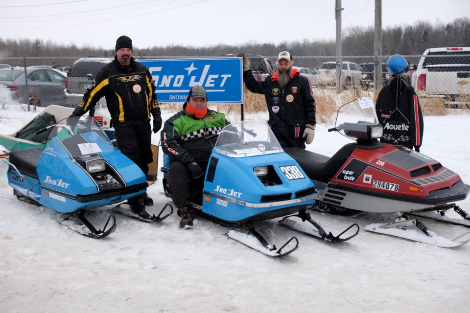 (Left to Right) Scott LeClair and his 1974 Sno-Jet SST, Mario Gaudenzi  and his 1973 Sno-Jet StarJeft 338 +2, and John Quinton with his 1974 Alouette Super Brute 295 at the I-500’s 14th Annual Vintage Snowmobile Show on Saturday. Photo by Jeff Klassen for SooToday