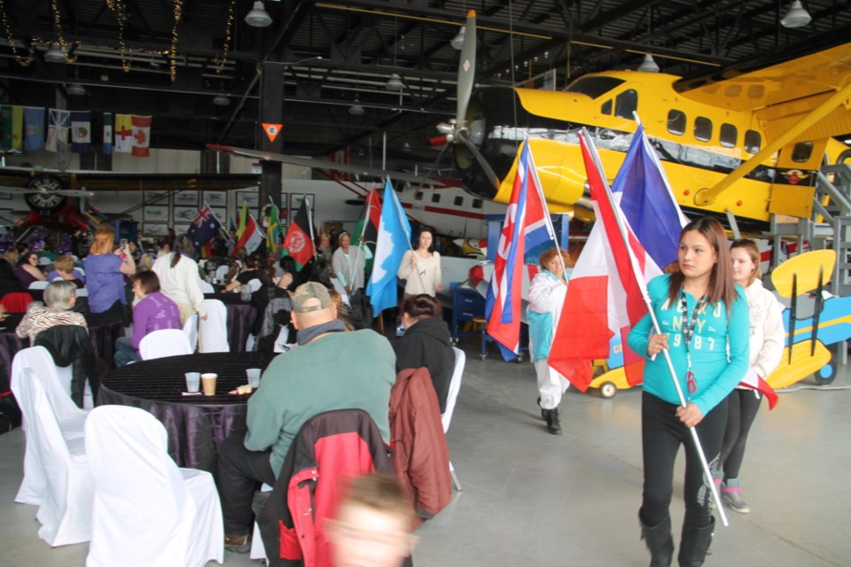 Women carried flags of many nations as a show of support for women’s rights around the globe at an International Women’s Day event held at the Canadian Bushplane Heritage Centre by Women in Crisis, March 8, 2018. Darren Taylor/SooToday