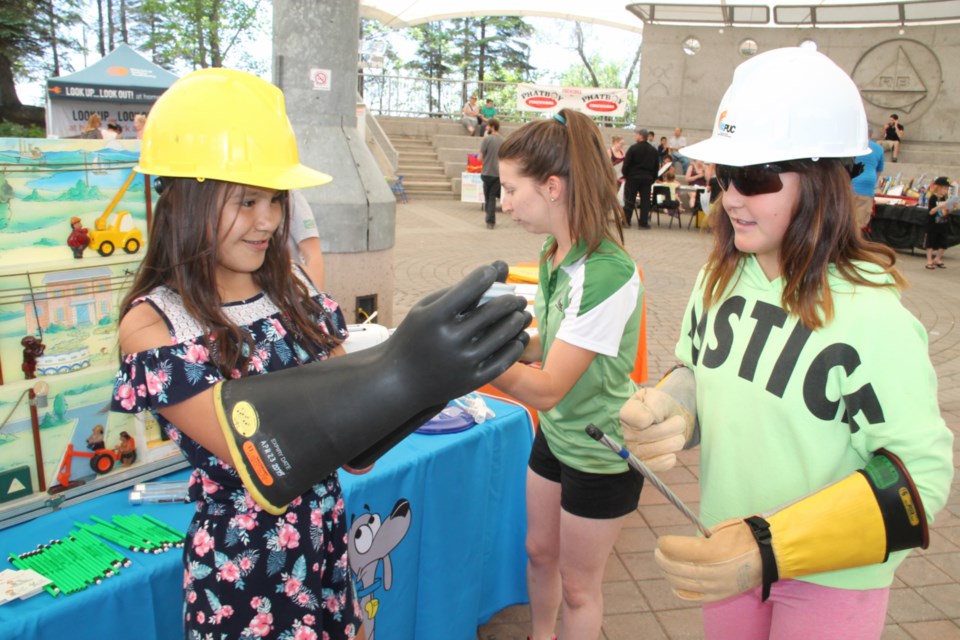 Children try on PUC protective personal equipment at the annual Kidz Summer Safety Festival held at the Roberta Bondar Pavilion, June 23, 2019. Darren Taylor/SooToday
