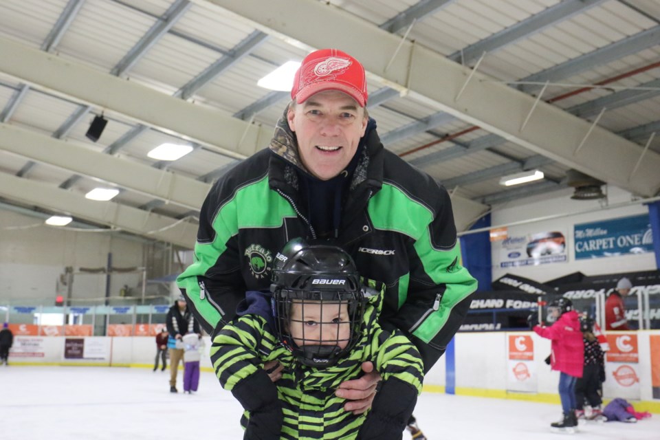 Scott Utter with his 4 year-old autistic grandson Drake, who is skating for the very first time. James Hopkin/SooToday