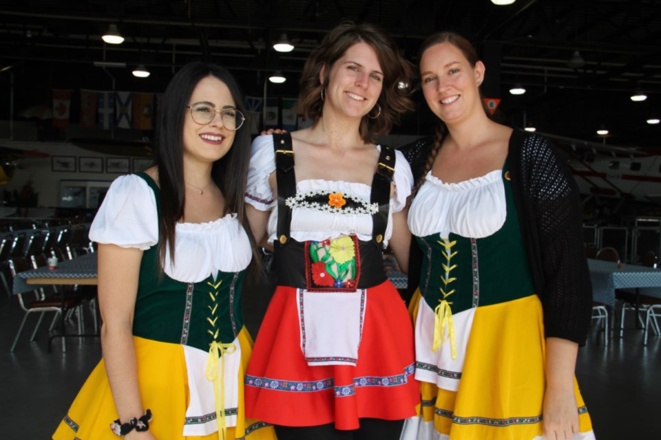 Amanda Palermo, Katie Babcock and Cyndi Singleton served up suds and smiles at the fourth edition of the Sault Ste. Marie Oktoberfest held at the Canadian Bushplane Heritage Centre, Oct. 13, 2018. Darren Taylor/SooToday 