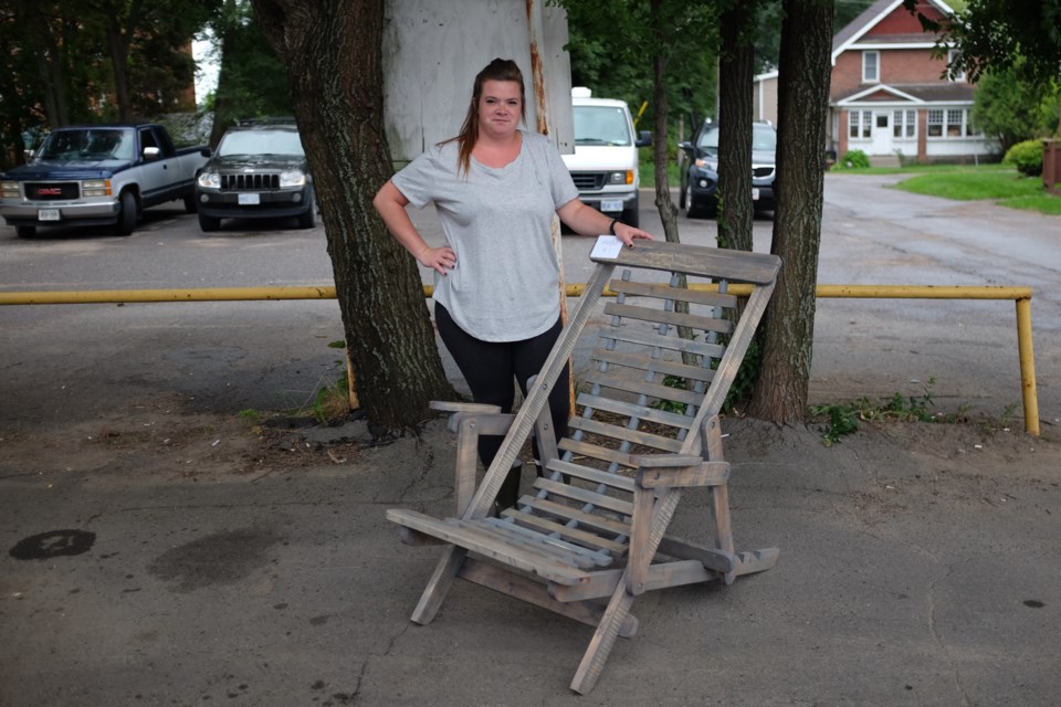 Pauline's Place revealed the winners of their First Annual Pallet Build Off on Saturday. First place was given to a lounge chair submission by Sheri, Mike, Tom, and Paul of Ergo Office Plus. The chair, as presented by Pauline's Place Residential Supervisor Tiffany Vanzant, was made almost entirely from old wooden pallets.  Jeff Klassen/SooToday