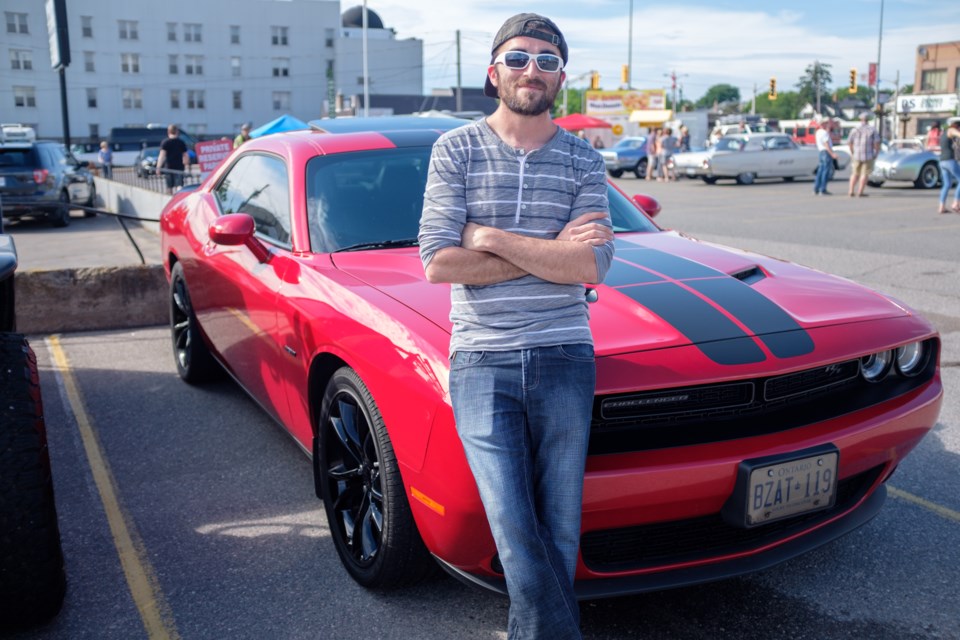 Zach Huckerby and his 2016 Dodge Challenger RT parked before the 2017 Queen Street Cruise on June 16. Jeff Klassen/SooToday