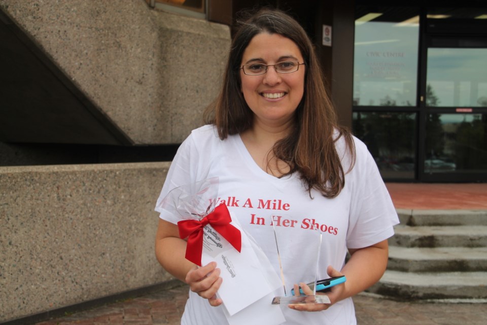 Nicole Vinette-Slukynsky won the top individual fundraiser award at the Walk a Mile in Her Shoes fundraiser in support of Women In Crisis held on the Sault Ste. Marie waterfront, May 26, 2018. Darren Taylor/SooToday
