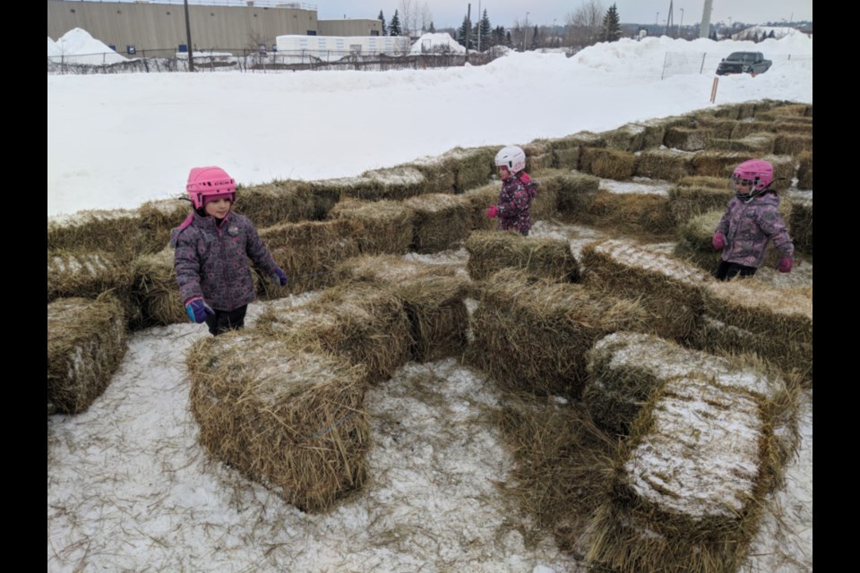 Children enjoy the PUC Outdoor Hay Maze, one of many Bon Soo activities held outside The Machine Shop, Feb. 2, 2019. Darren Taylor/SooToday