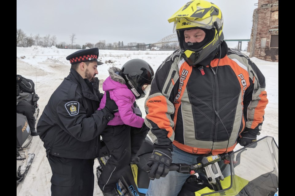 A steady stream of children enjoyed snow mobile rides provided by Sault Trailblazers, Sault Police and OPP as part of Bon Soo festivities outside The Machine Shop, Feb. 2, 2020. Darren Taylor/SooToday