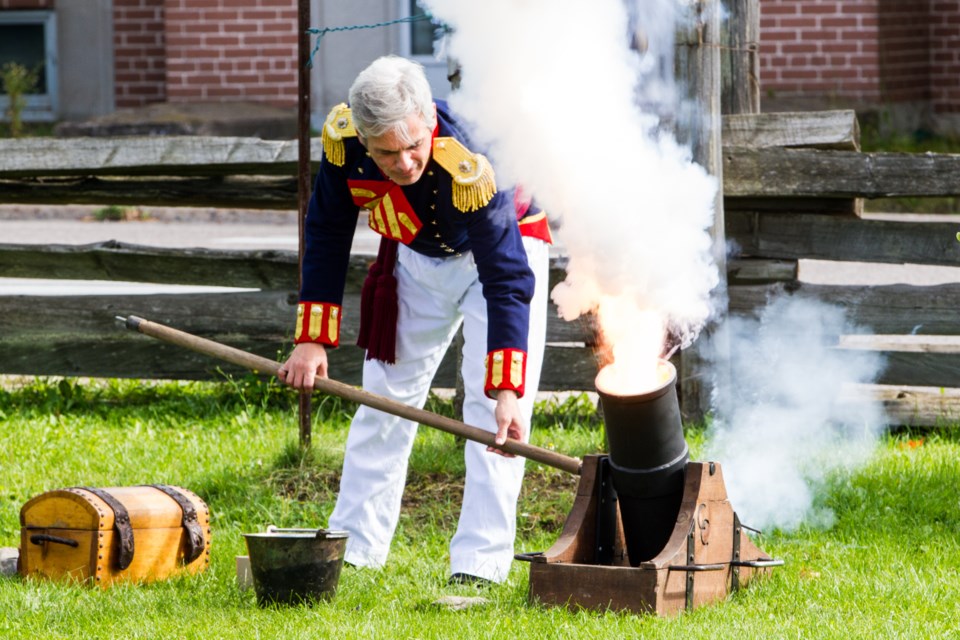The candy cannon is fired during the annual Fall Rendezvous at the Ermatinger-Clergue National Historic Site on Friday, September 30, 2016. Donna Hopper/SooToday