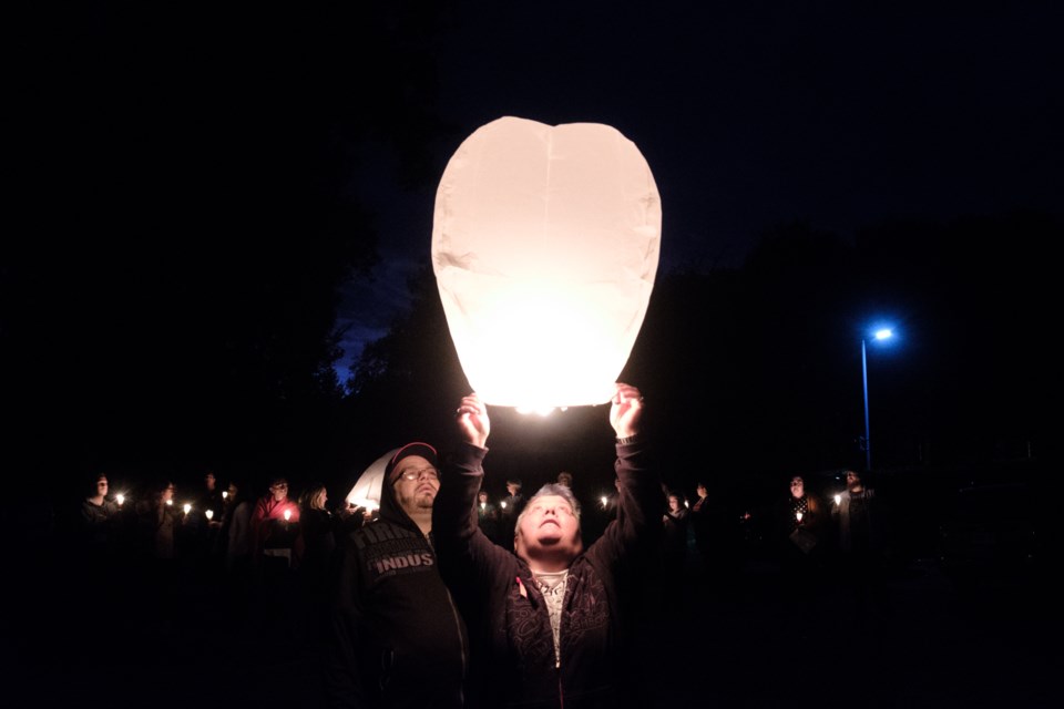 A sky lantern being launched. A candlelight vigil for those with HIV and AIDS was held at Bellevue Park on Sunday. The vigil was part of Pridefest. Jeff Klassen/SooToday


