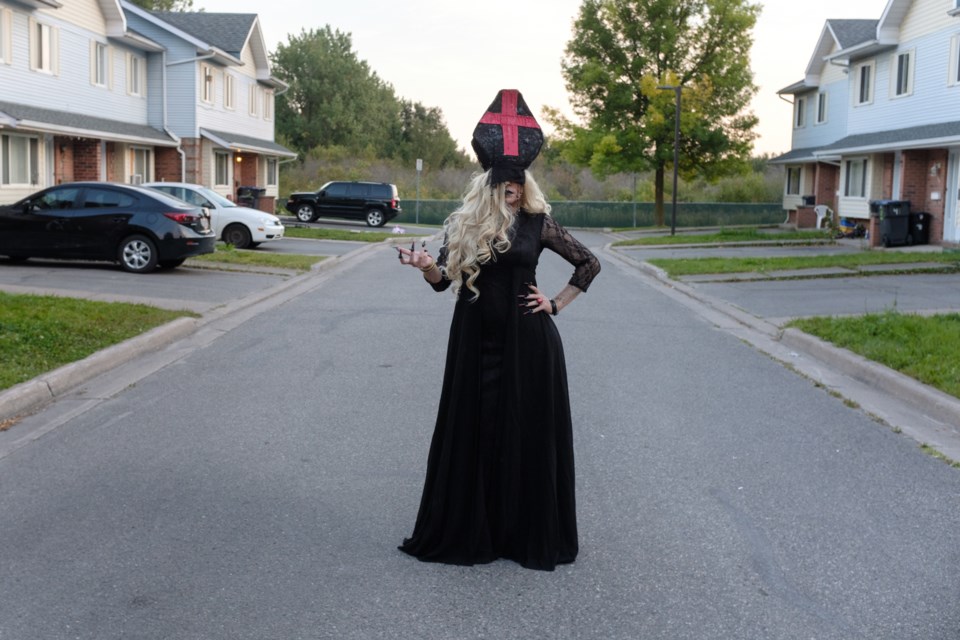 Local drag queen William Armstrong - stage name Paris Gore - dressed up in a dark pope outfit before a Pride Fest performance on Saturday. Armstrong got into drag as a way of coping with HIV. Jeff Klassen/SooToday