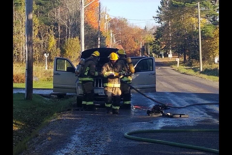 Firefighters respond to an SUV on fire on Moss Road. James Hopkin/SooToday