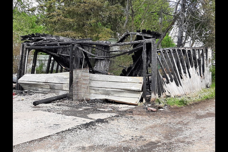 Fire destroyed a structure in the backyard of a residence in the 100 block of Walnut Street on Monday. Darren Taylor/SooToday