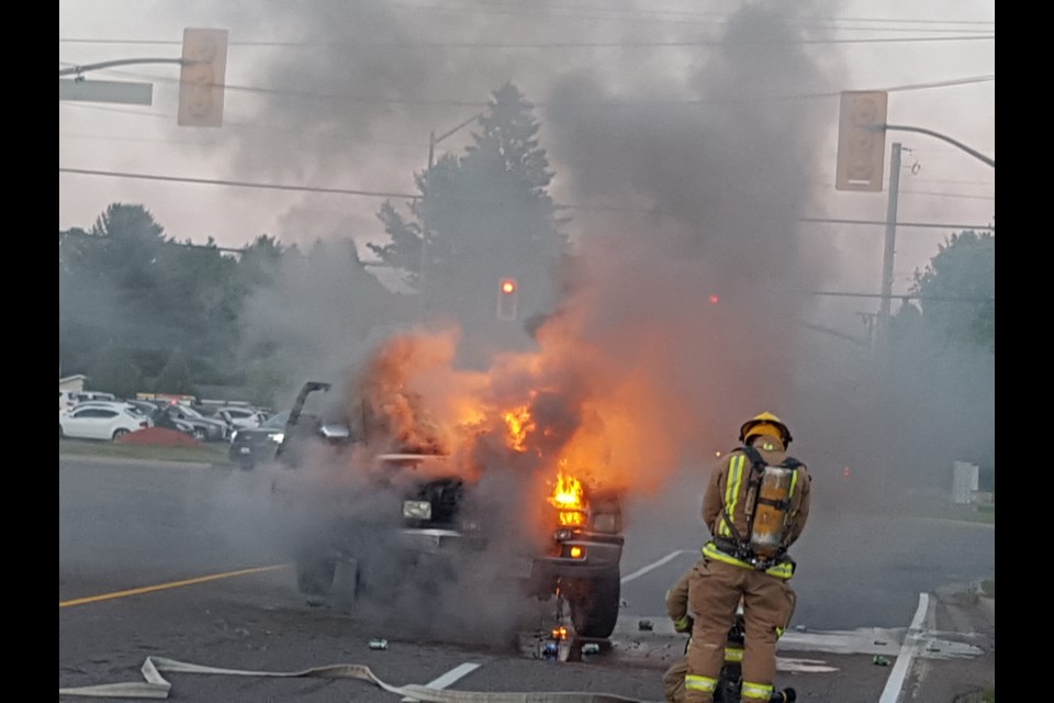 Firefighters doused a truck on fire at Fourth Line and Great Northern Road on Tuesday, June 21, 2016. Reader submitted photo.