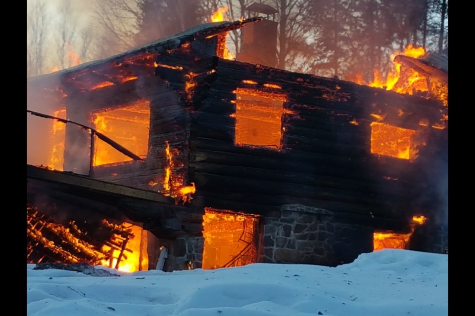 The Evans family's off-the-grid, two-storey log cabin north of Echo Bay burned to the ground on the evening of Feb. 28. Photo supplied by Tammy Evans