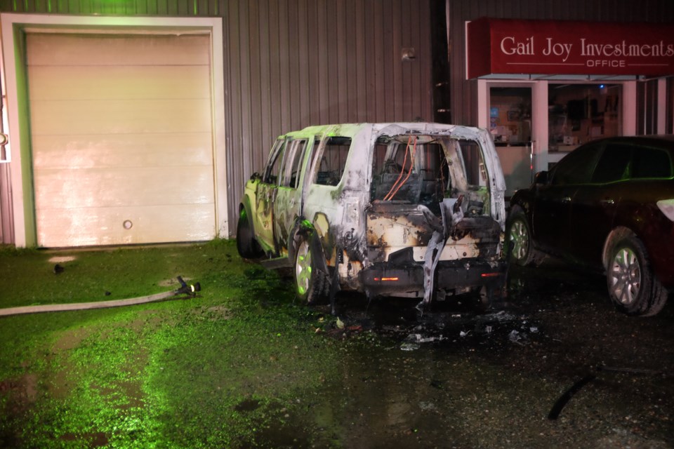 An SUV was left melted and burnt after a fire early Sunday morning. Fire and police services responded to the scene. Photo by Jeff Klassen for SooToday