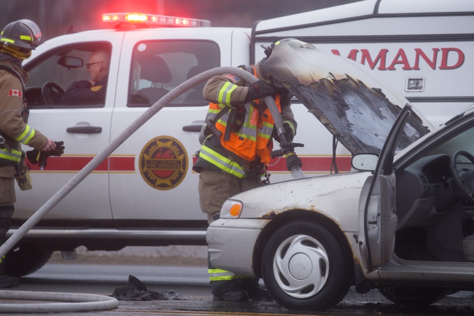 Sault Ste. Marie Fire Services at the scene of a Friday morning car fire that briefly blocked the westbound lanes on Second Line west of Black Road.