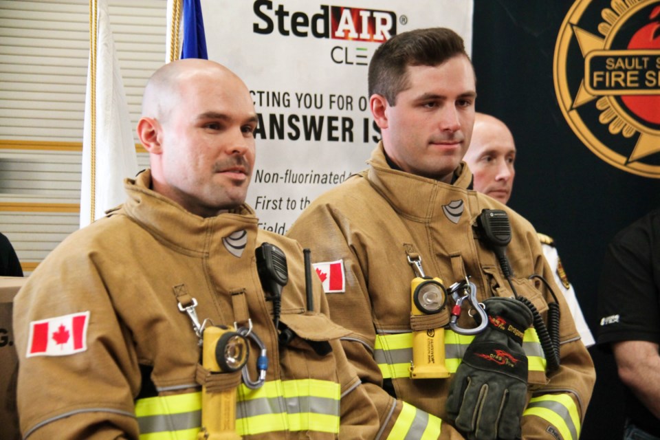 Sault Fire Services firefighters Aidan Wright and Nolan Makkonen wearing new PFAS-free coats and pants - designed to reduce the risk of fire-related cancer to firefighters - at a news conference held at Fire Hall 1 on Tancred Street, May 9, 2024.