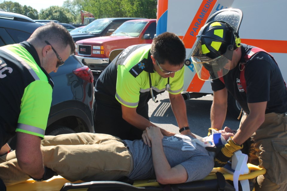 Sault EMS paramedics, Fire Services, Police and Teens Learn to Drive educators spoke to high school students at Korah Collegiate about the potentially tragic results of dangerous driving, June 6, 2017.  Darren Taylor/SooToday