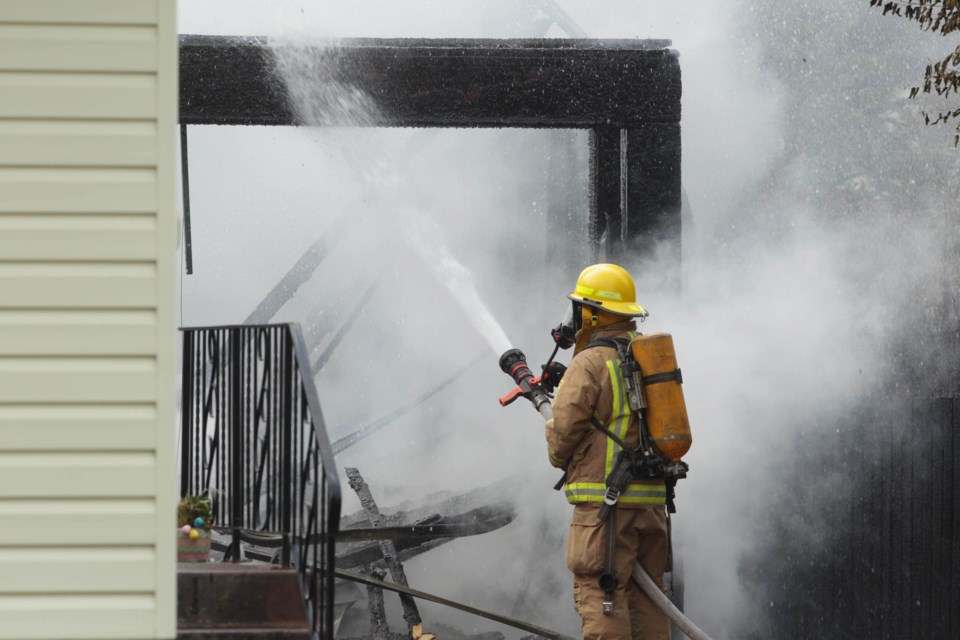 Firefighters respond to a garage fire at 359 Courtney Crescent on July 18, 2016. Kenneth Armstrong/SooToday