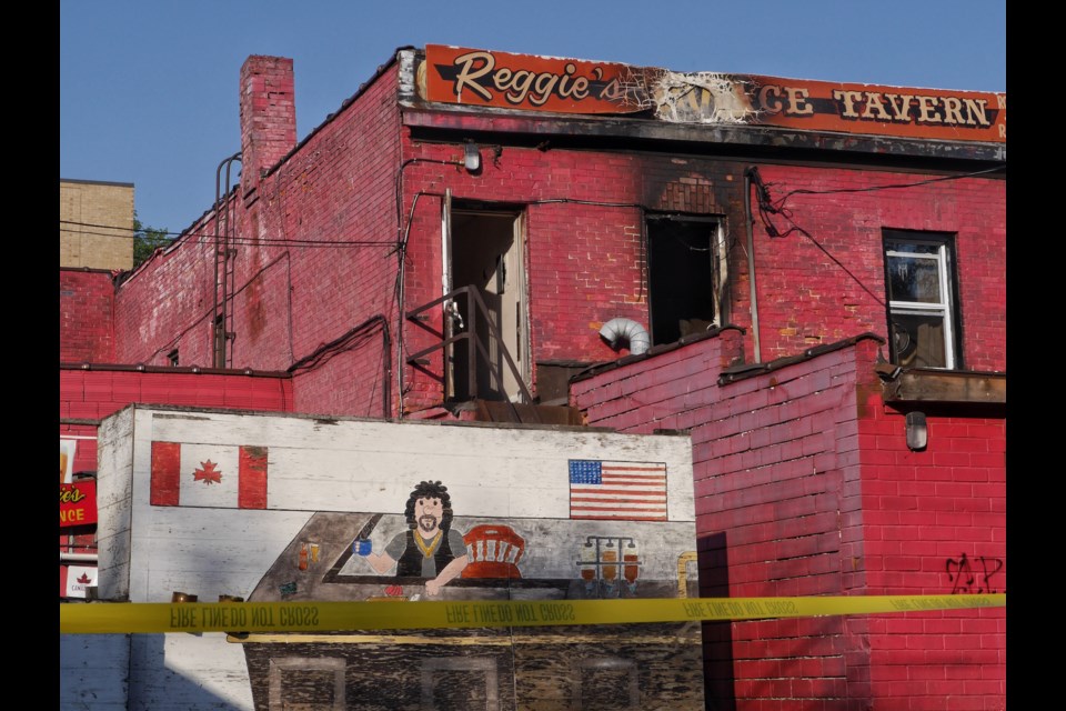 Fire damage is visible on Monday, July 31, 2017 after a blaze Sunday that caused the evacuation of a number of apartment residents At Reggie's Place on Queen Street. The window that shows sign of burning, next to the door, is now boarded up. Bar-owner Reggie Daigle said the room shows signs of extensive damage. Michael Purvis/SooToday