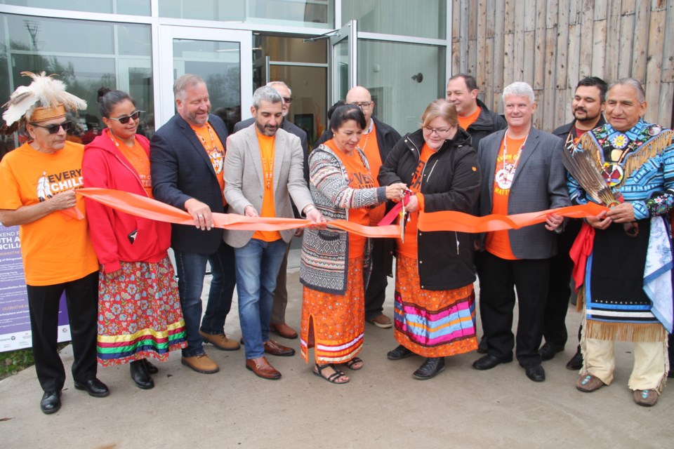 Shingwauk Kinoomaage Gamig officially opened with a ribbon cutting ceremony attended by Indigenous and non-Indigenous leaders and educators, September 30, 2022.