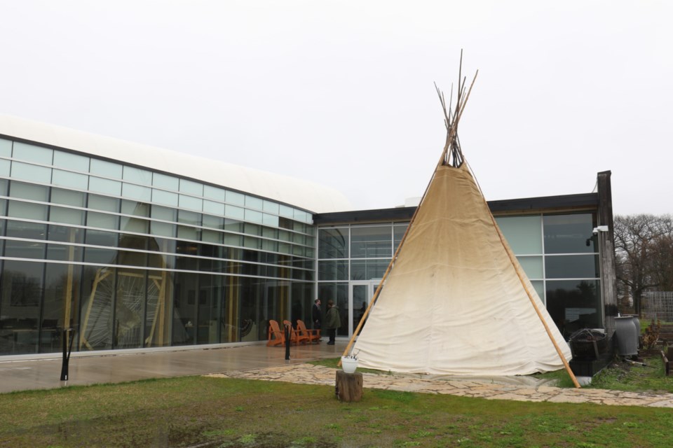 A teepee and sacred fire were established outside of Shingwauk Kinoomaage Gamig Friday for Red Dress Day, which is held May 5 each year to raise awareness of Missing and Murdered Indigenous Women, Girls, Two-Spirit and Gender Diverse persons (MMIWG2S+). 