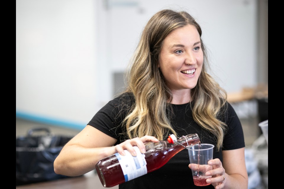 Brittany Park, co-owner of Bloom Kombucha, pours a sample of locally-produced kombucha at a funding announcement Thursday at the Harvest Algoma Food Resource Centre.