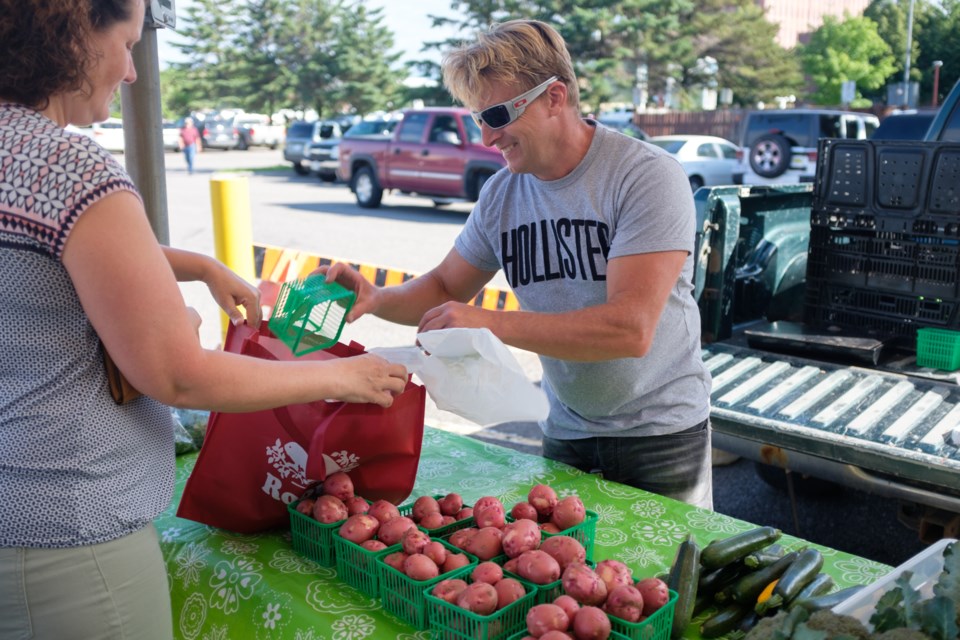 Jeff Marhsall has been selling at the Algoma Farmer's Market for 35 years. 'When I was first starting out, another seller didn't like that my tomatoes were outselling his so he jumped over the table and tried to strangle me. I was only 15-years-old and he was 30-40. Luckily a firefighter was there and pulled him off me.'