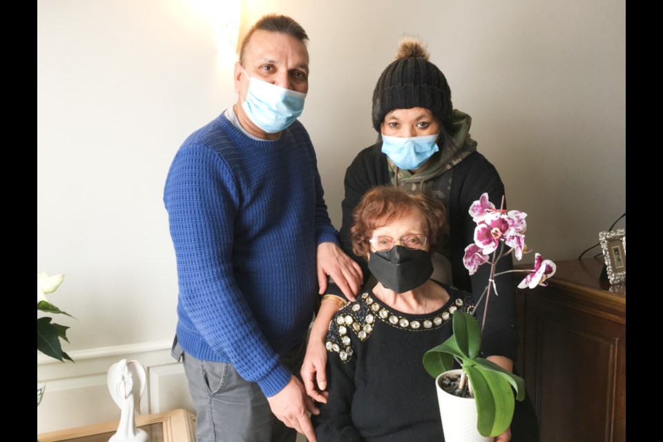 Mom’s Kitchen owners Raju and Mamta Sehgal with Barbara Bruni, Feb. 10, 2022.