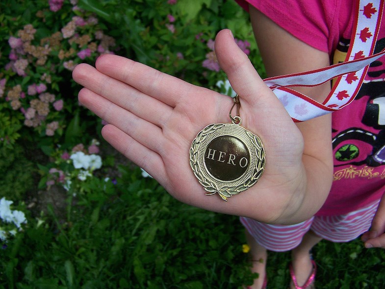 Emma Houghton, age 8 Winner of the girl's bike in the &quot;Jumpstart&quot; bicycle rodeo part of the Hub Trail Festival 2015. Emma was presented with a gold medal as Hero of the Hub Trail Festival 2015.
