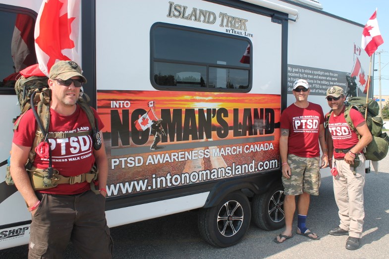 Scott McFarlane, Jason McKenzie and Steve Hartwig with their Into No Man's Land trailer