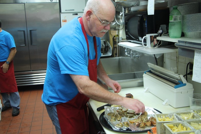 Paesano Foods employee Tom Moran with food samples. Darren Taylor/SooToday