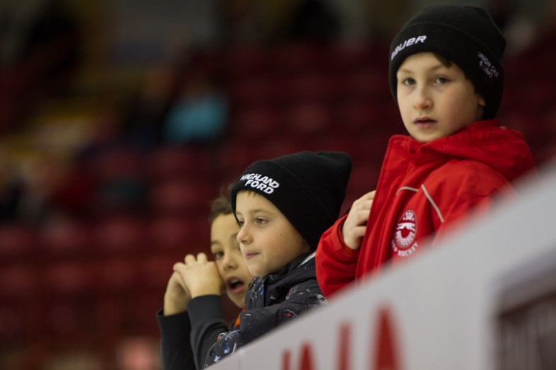 Young fans cheer on Team Jacobs during the quarter final draw on November 22, 2014 at the Essar Centre in Sault Ste. Marie. Donna Hopper/SooToday