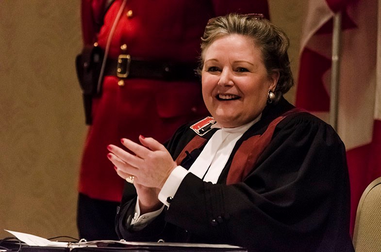 Photo by Brad Jones - Sootoday/ Judge Karen McMillan congratulates new Canadian citizens 