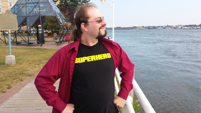 On the lookout for villains? Superhero surveys the Sault waterfront