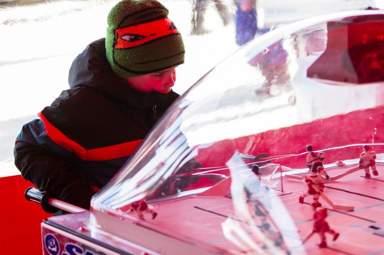 Visitors enjoyed some bubble hockey during the Rogers Hometown Hockey celebration at the Bondar Pavilion on Saturday, February 28, 2015. Donna Hopper/SooToday